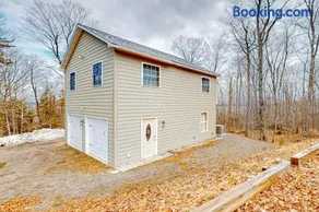 Lake-view two-story home with beach access, wood stove, grill, W/D, & fast WiFi - Image 1