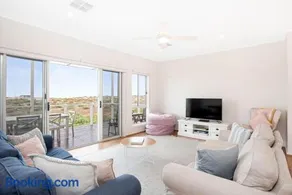A Dunes View - Coastal Calm with Fire Pit & Deck - Image 1