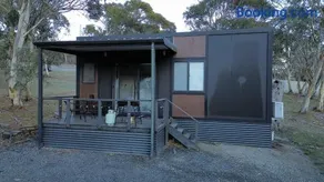 The Frosty Trout - Lakeside Snowy Mts Tiny House - Image 1