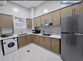 Al Ain Hotel Apartment Family Stay with Balcony and Pool Access - Image 4