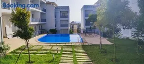 Magnifique Appartement de standing à Tanger avec Vue sur Mer et Accès Piscine - Image 1