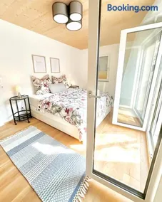 DIMA Apartments Cozy Lakeside Stay - Image 1