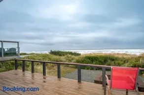 Steps to the Beach, Charming Oceanfront Bungalow with Deck and Ocean Views - Image 2