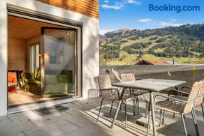 Stylish Alpine Hideaway with Panoramic Views - Image 2