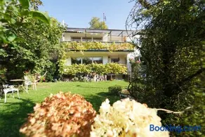 Ferienwohnung im Haus Lotus mit großem Balkon und Garten - Image 1