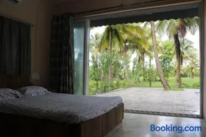 Priti Garden Farmstay, Kelwa Palghar -4 BR farmhouse with pool, pond, games,bbq - Image 3