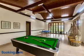 SaffronStays Ananya - 4BR villa with pool, minibar & game room near river Ullas in Karjat - Image 1