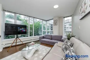 Spacious Downtown Condo with Pool Gym & Parking - Image 1
