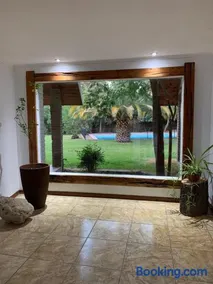 Parcela con Casa, Terraza, Piscina y Quincho en Pirque - Image 1