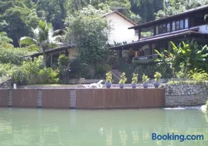 Casa de 730m2 no Exclusivo Condomínio Portogalo com Piscina Privada e Cais para iates de até 55 Pés - Image 3