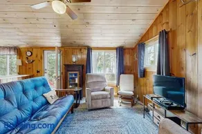 Quiet lakefront cottage with a firepit, private beach, & two kayaks - Image 2