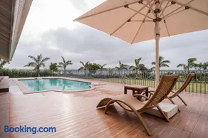 StayVista's Eva Villa - Lakeside Luxury with Modern Decor, Pool & Expansive Lawn - Near Sula - Image 5