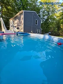 Modern Woods Pocono Cabin with Pool and Fire Pit - Image 1