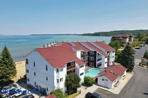 Beachside 213 with Pool Hot Tub and Private Deck overlooking East Bay - Image 3