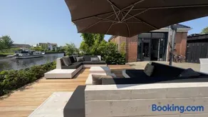 PUUR Eastermar - monumentaal, authentiek en luxe koetshuis aan open vaarwater met jacuzzi en sauna - Image 5