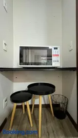 Suíte Econômica com Conforto de Luxo Próxima à Praia e aos Eventos - Image 2