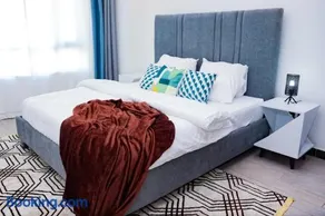 modern serenity suites apartments with swimming pool,modern equipped gym,private parking space, children playing ground, proximity to major shopping malls and unbeatable city views - Image 5