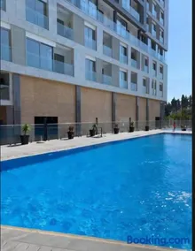 PMTR BAR Luxury Sea View 2BR Apartment Modern Pool Parking - Image 4