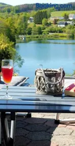Seeblick-Ferienwohnung "Agger-Blick 1" mit großer Terrasse, kostenlosen E-Bikes, Sauna & Kajak - Image 1