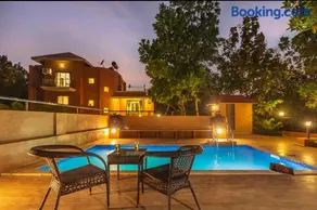 SaffronStays Ekaant- 3BR pet-friendly pool villa with lawn, games & river walk in gated community near Mumbai - Image 1