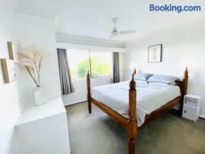 Bright 2BR Retreat Pool View 12 Mins Airport - Image 2