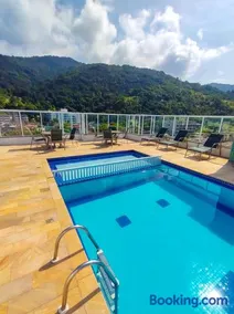 Apartamentos a 200m praia das Toninhas - Condomínio Vista Verde | Piscina na Cobertura com vista Espetacular - Image 1