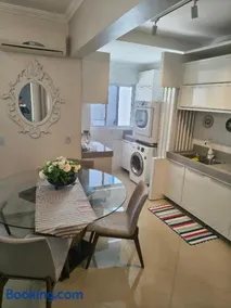 Apartamento aconchegante com ar, secadora e adega - Image 3