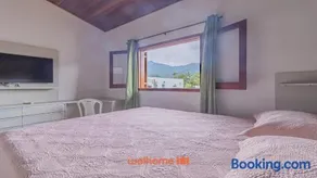 Casa em Ubatuba com churrasqueira e varanda ampla - Image 5