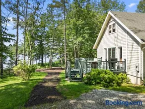 Sunny, lakefront home on South Pond with private dock, great deck & firepit - Image 2