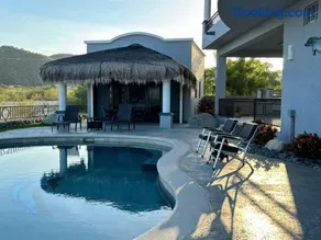 Sunny Poolside Escape Near the Beach - Image 3