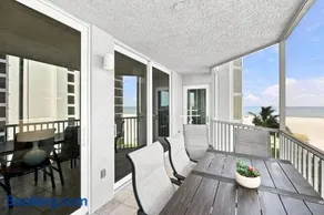 Beachfront Bliss Cozy Condo with Patio Pool & Stunning Views - Image 2