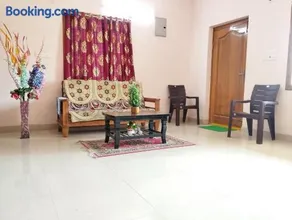 SLS Homestay - Luxury AC Service Apartments 1BHK, 2BHK, 3BHK - Direct Flyover to Alipiri Tirumala Gate - Walk to PS4 Pure Veg Restaurants, Supermarkets - Near to National Highway & Padmavathi Amma Temple - Modular Kitchen, Living room -Free Superfast Wifi - Image 4