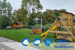 Neues Ferienhaus für Familien mit Garten und Sauna - Image 1