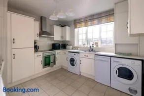 Elegant Village Stay Parking and EV Charger - Image 4