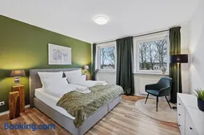 MAISUITES Sperling - Zentrale Ferienwohnung mit Boxspringbett, Kaffeevollautomat, WLAN & seitlichem Seeblick - Image 4
