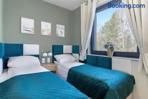 Bałtycka Oaza - Apartament z Ogrodem i Parkingiem - Basen, Jacuzzi, Sauna by Noclegi Renters - Image 2