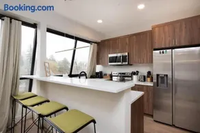 Modern condo with town and mountain views - Image 3