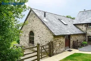 Smiddy Cottage, Historic Village Hub with Spacious Lounge, High Ceilings, and Wood Stove - Image 1