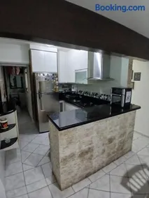 Lindo apartamento em frente à praia com piscina - Image 3