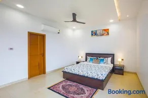 ELIVAAS Signature Lush Haven 4 BHK Villa Private Pool, Terrace & Landscaped Garden - Image 2