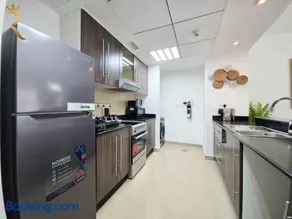 Balcony 1BR Retreat - Stylish Dining Escape - Image 3