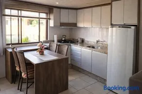 Casa 2 Quartos c/ Ar e Garagem | Próx. BRF Centro - Image 1