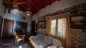 Traditional Stone House with Modern Renovation - Image 1