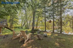 Riverfront Getaway with Hot Tub and Scenic Views - Image 4