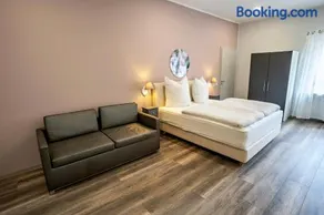 Flora Comfort Inn - Image 2
