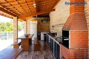 Casa bem equipada com piscina,churrasqueira e WiFi - Image 2