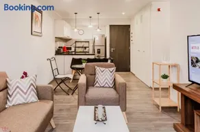 Stylish 2BR Apartment Balcony View - Image 1