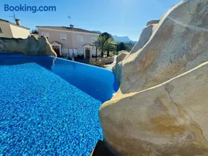Calpe Casa adosada entorno playa y montaña tranquilidad relax jacuzzi piscina wifi aire jardin barbacoa y parking - Image 1