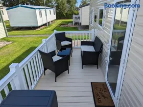 The Jones's Family Caravan with private decking - Presthaven - Image 2