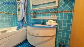 Bright room with private bathroom and market square view - Image 1